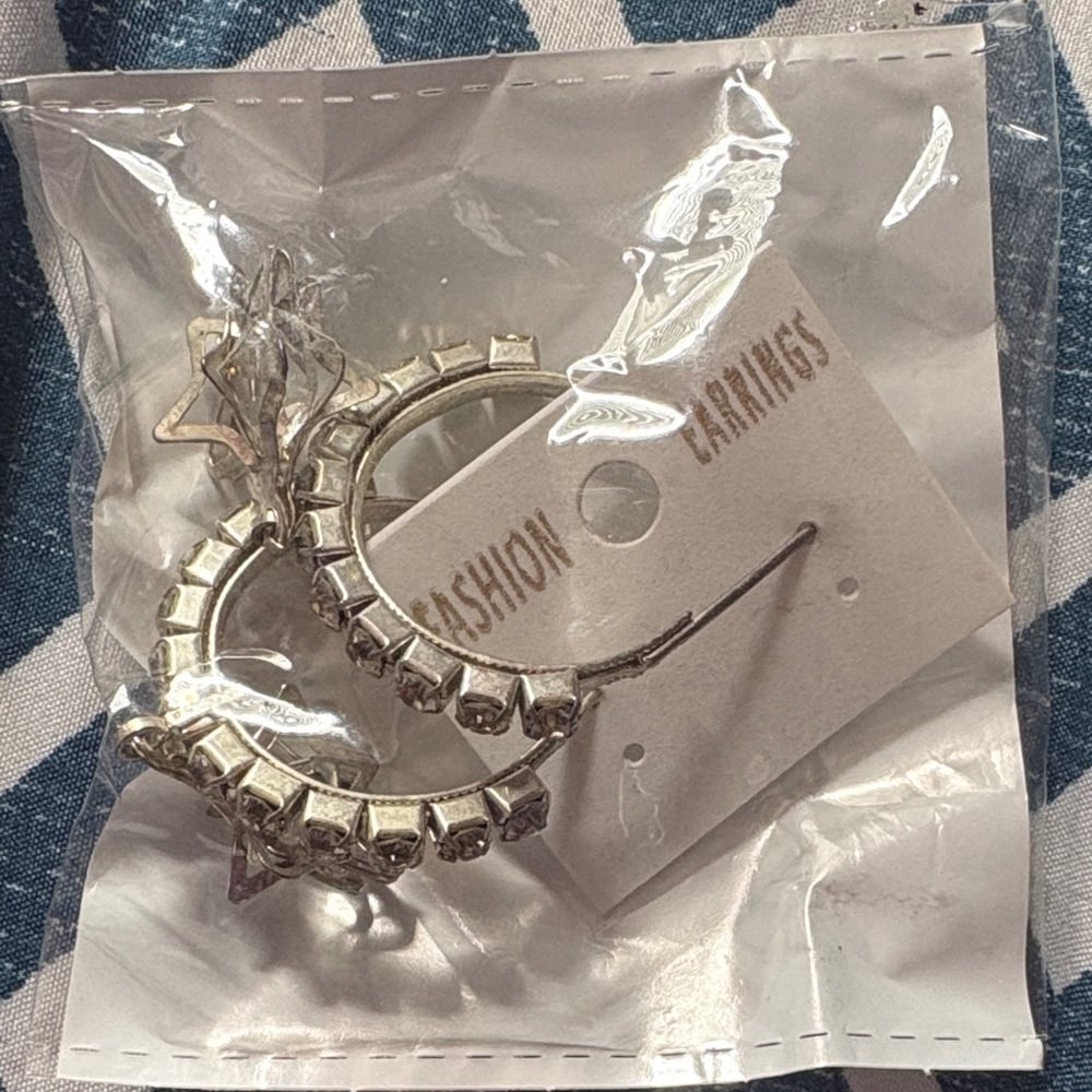 Silver hoop star brand new earrings